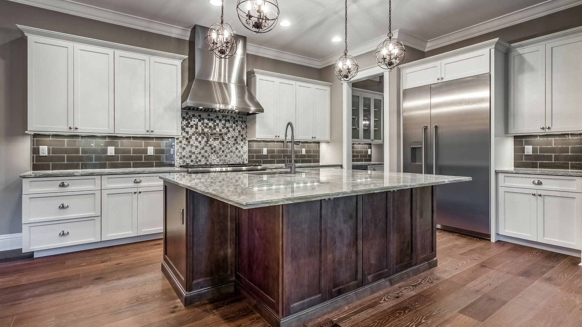 Luxury kitchen boasting a custom island and tile throughout, St. Petersburg FL